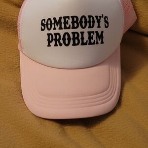 Pink Trucker Hat with 'Somebody's Problem' Text